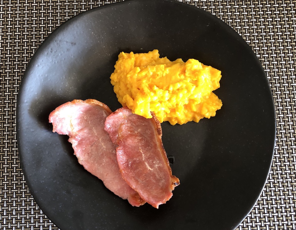 Breakfast of Cornish bacon and scrambled eggs