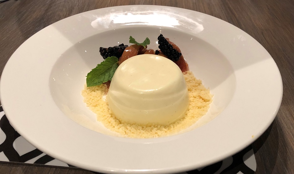 buttermilk pannacotta with orang and mint roasted plums and shortbread the Herring restaurant Bedruthan Hotel