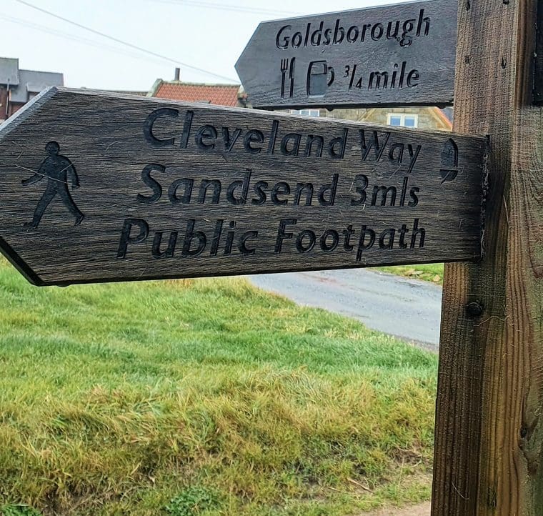 Signpost pointing to Sandsend on the Cleveland Way National Trail