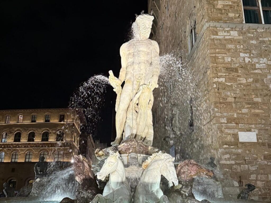 A fountain at night in Florence