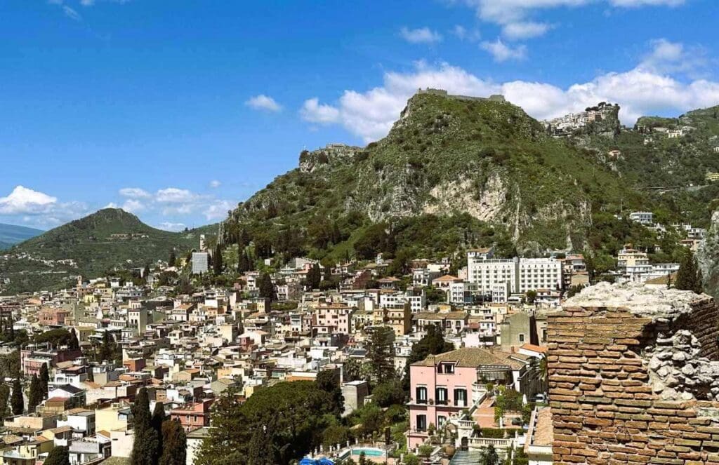 View of Taormina with NH Collection Taormina in background. Taken from Teatro Antico
