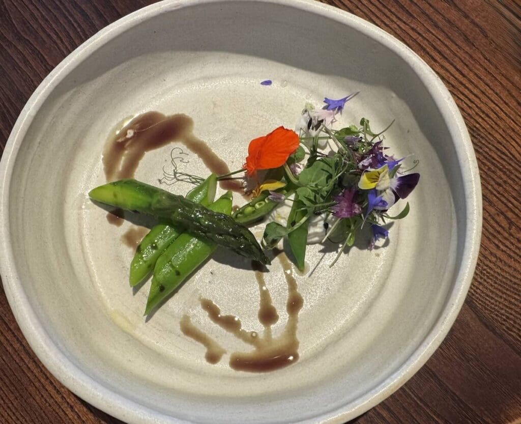 English asparagus with goats curd pea shoot & garden flowers