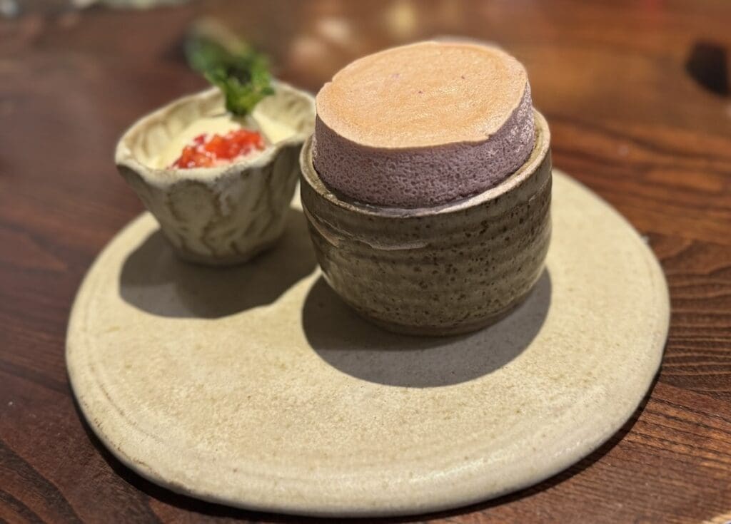 Strawberry souffléb with clotted cream ice cream at The Three Fishes