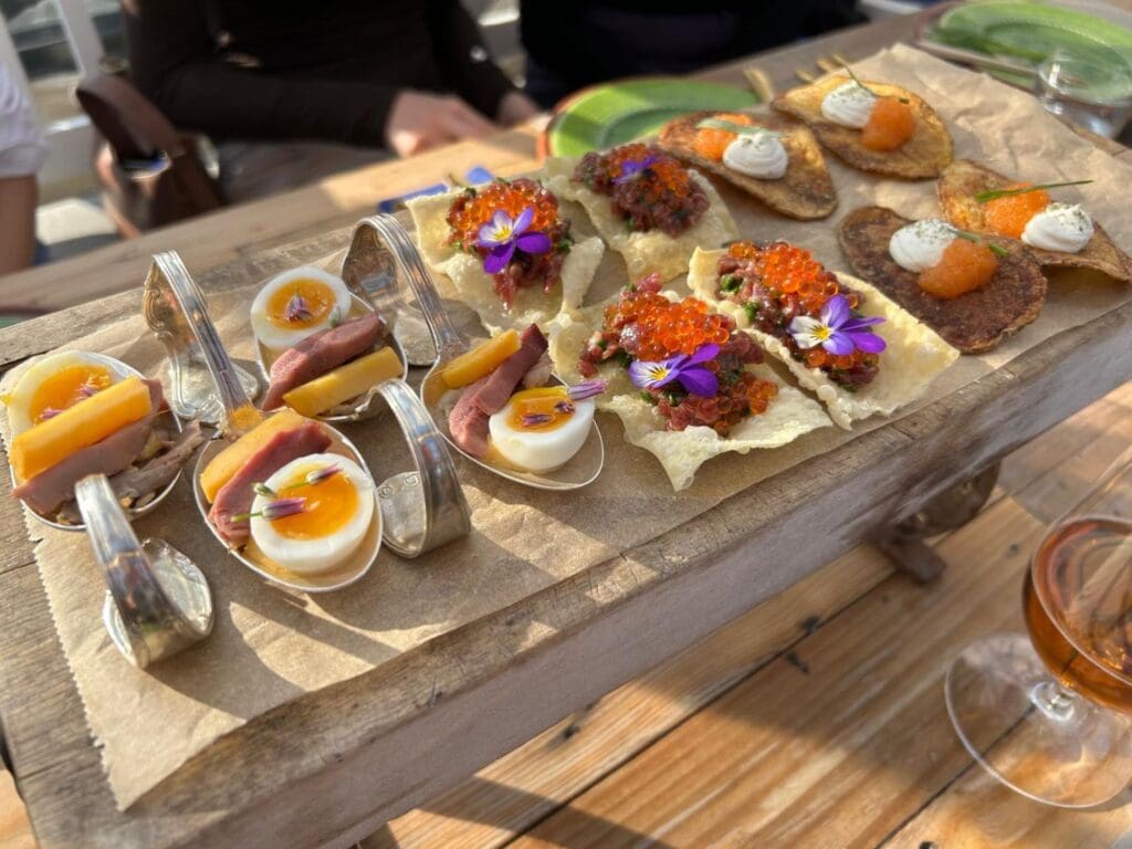 A selection of brightly coloured finger food served on a platter at Solgarden restaurant in Sweden