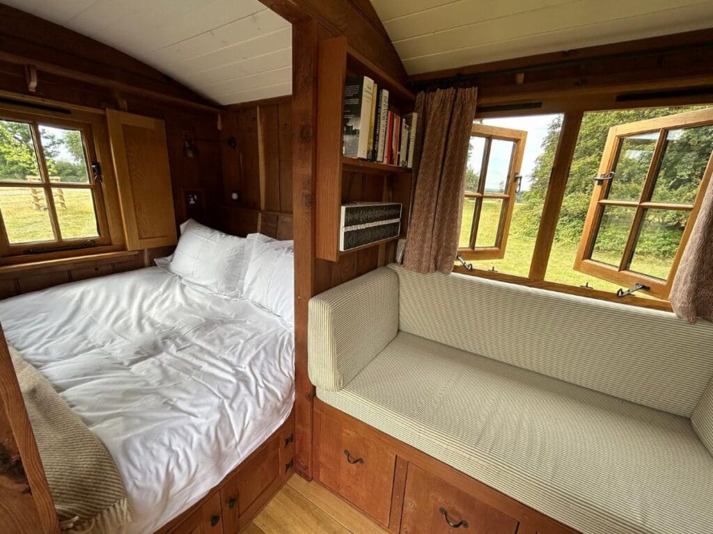 Interior view of Redwood Shepherd's Hut at Stonor Estate