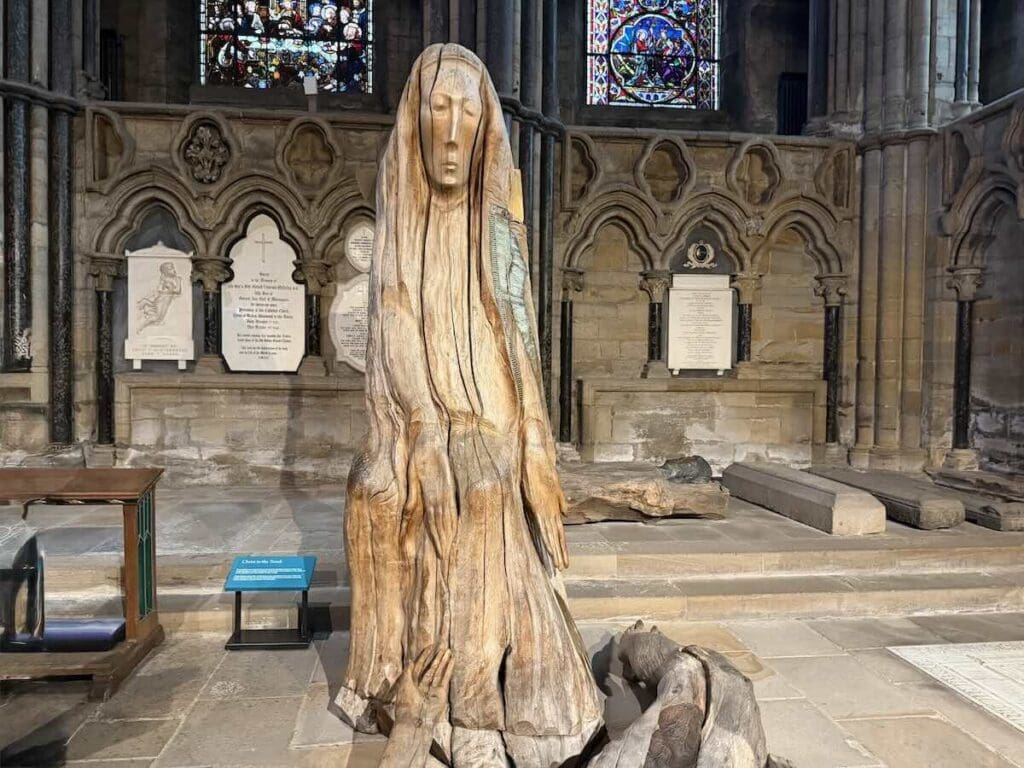 Pieta wooden sculpture by Fenwick Lawson in Durham Cathedral