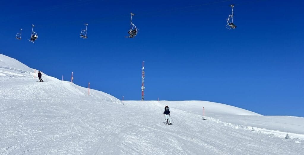 Blue skies empty piste in Davos