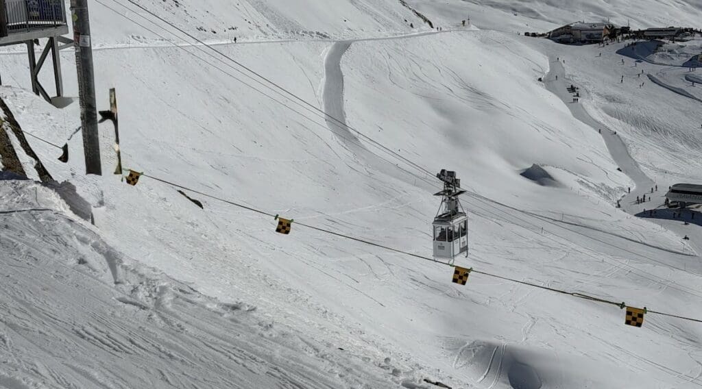 Pedestrian and skiers gondola up to Jakobshorn