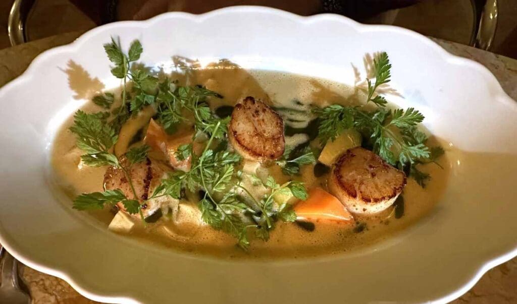 Olise Restaurant Copenhagen seared scallops with vegetables sauce nage