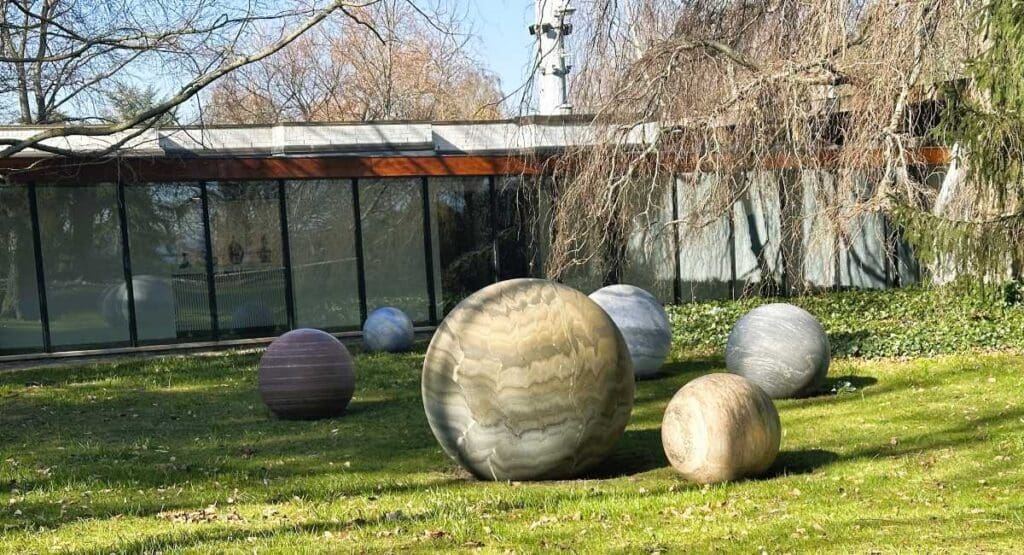 Alicja Kwade stone spheres in sculpture garden at Louisiana contemporary art museum
