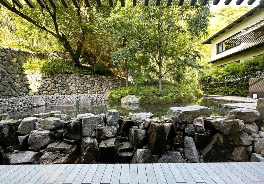 Banyan Tree Higashiyama Kyoto has a garden with stone walls and pond.