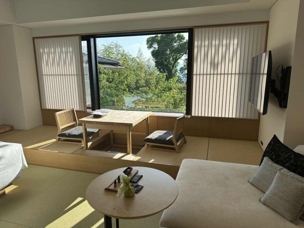 Banyan Tree Higashiyama Onsen Retreat room with traditional Japanese seating area.