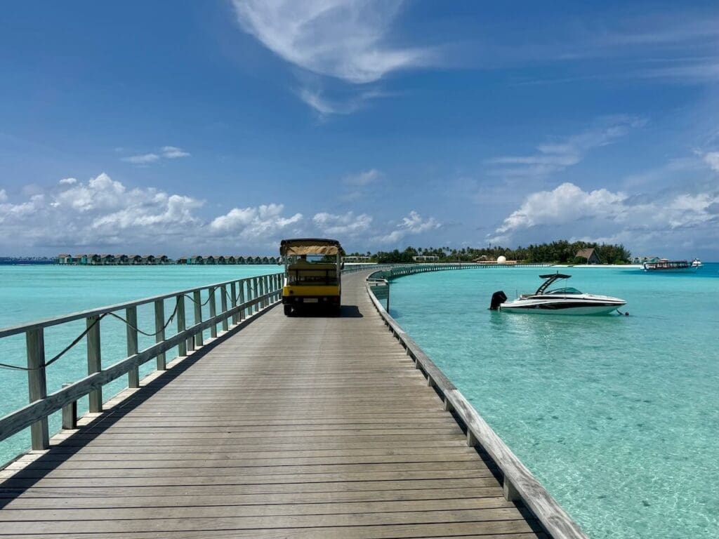Bridge between islands at Crossroads Maldives